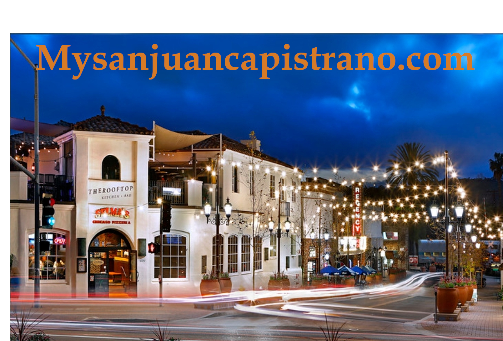 San Juan Capistrano historic downtown at twilight with string lights